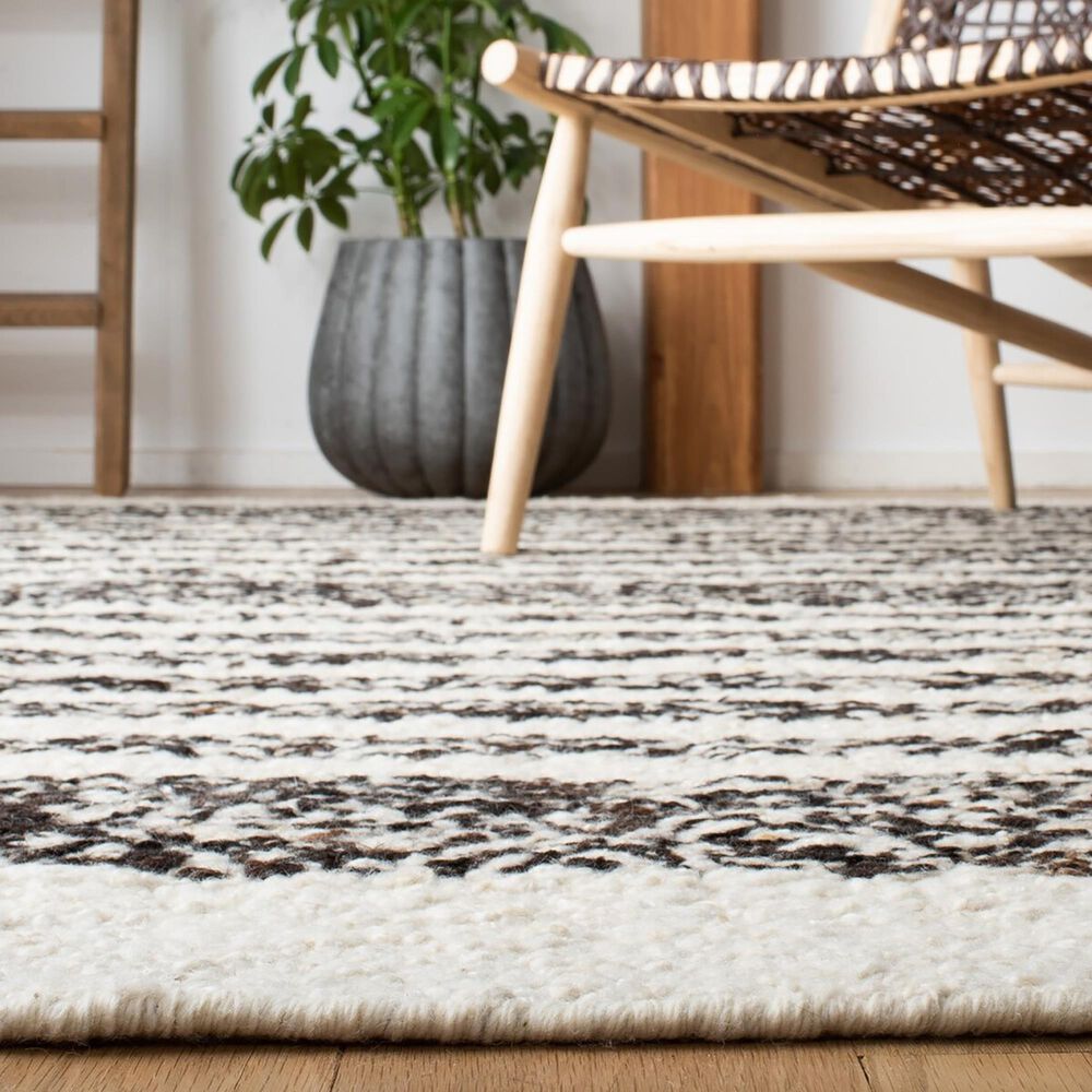84669-safavieh-natura-nat329z-5-x-8-black-and-ivory-area-rug-1.jpg
