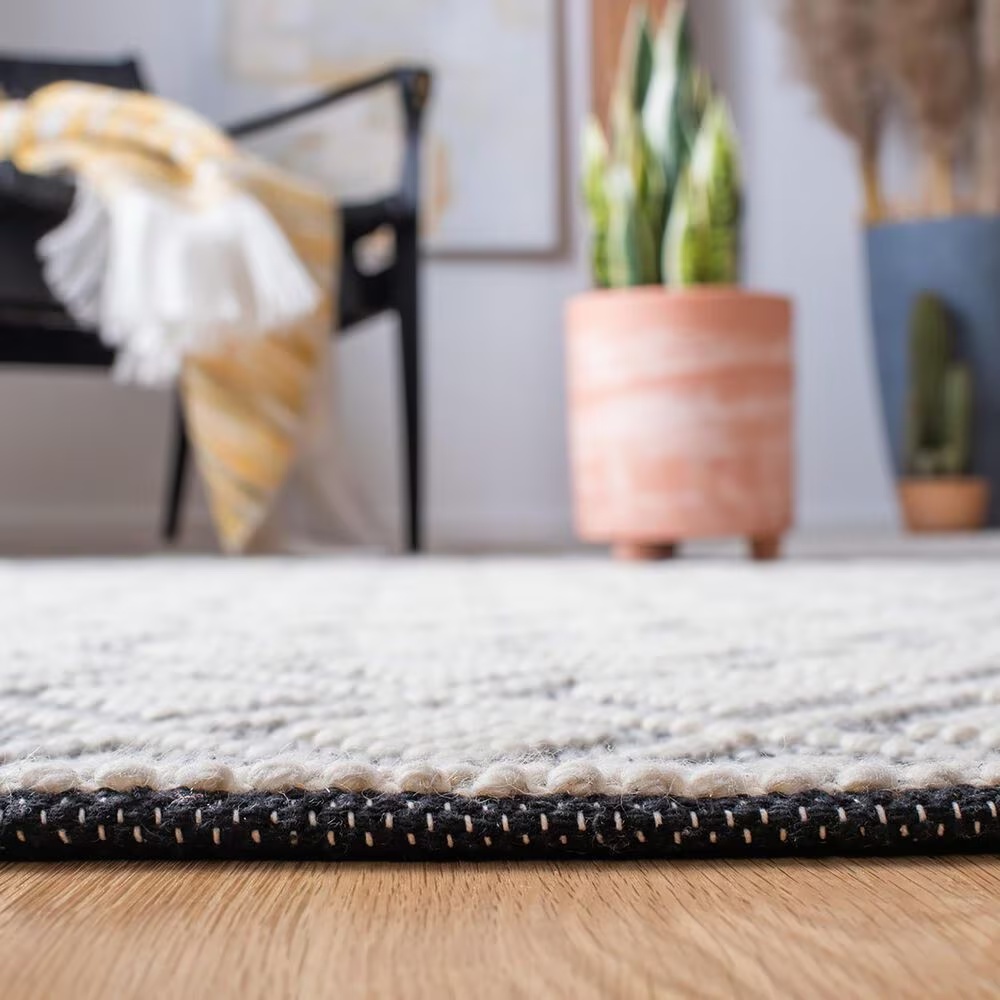 84790-safavieh-natura-nat475a-8-x-10-ivory-and-black-area-rug-1.jpg