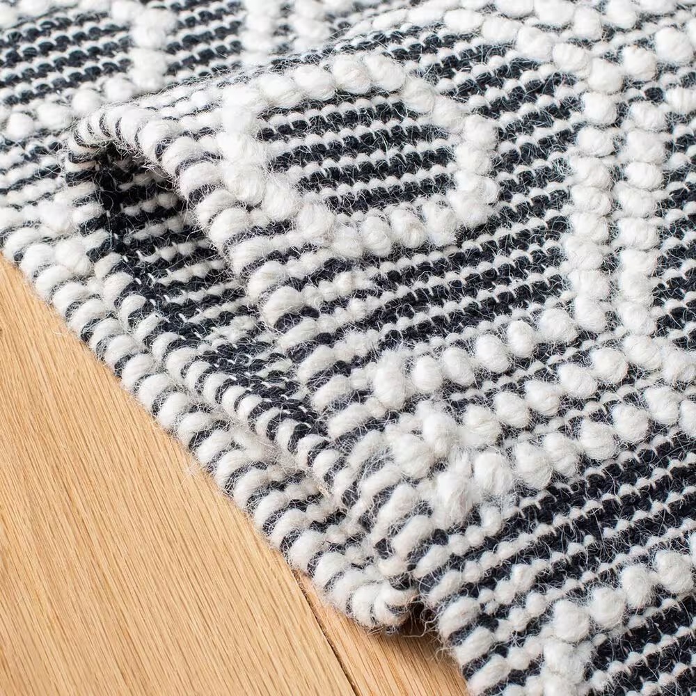 84797-safavieh-natura-nat476a-8-x-10-ivory-and-black-area-rug-1.jpg