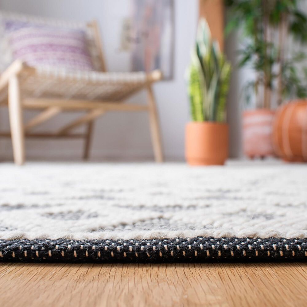84815-safavieh-natura-nat479a-5-x-8-ivory-and-black-area-rug-1.jpg