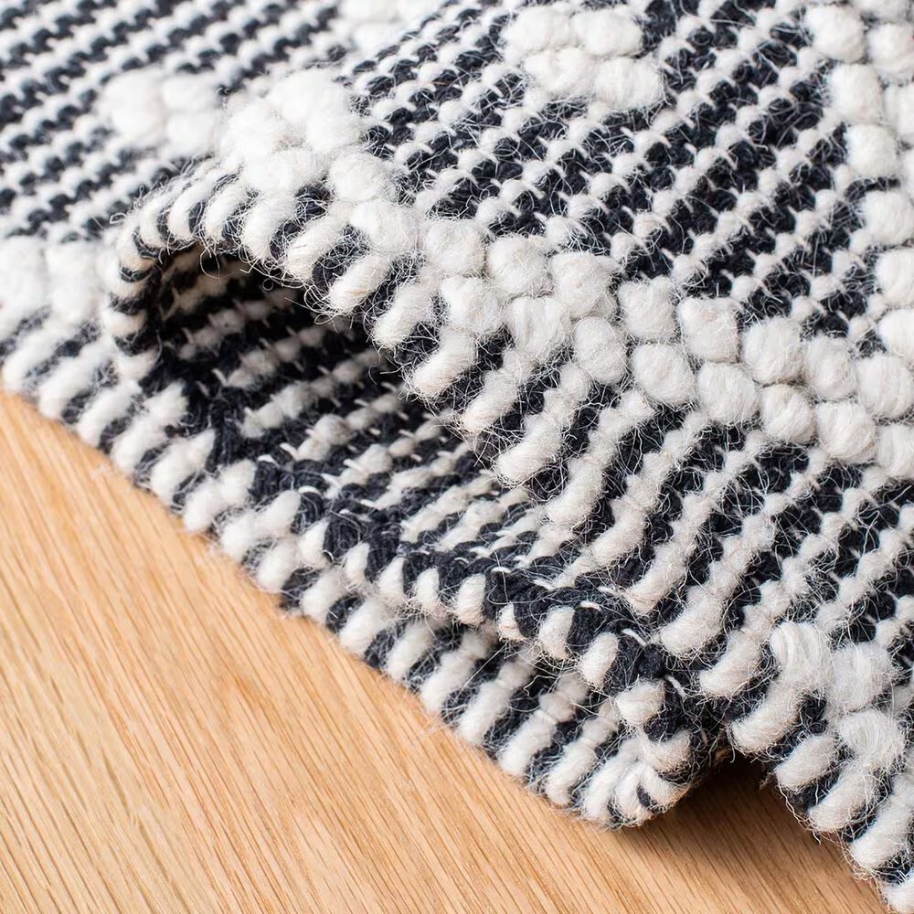 84828-safavieh-natura-nat482a-4-x-6-ivory-and-black-area-rug-1.jpg