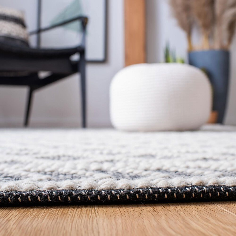 84829-safavieh-natura-nat482a-5-x-8-ivory-and-black-area-rug-1.jpg