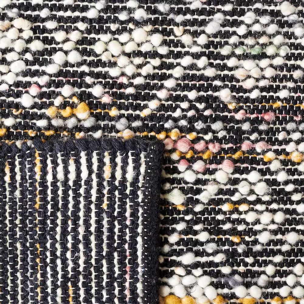 85099-safavieh-natura-nat615z-5-x-8-ivory-and-black-area-rug-1.jpg