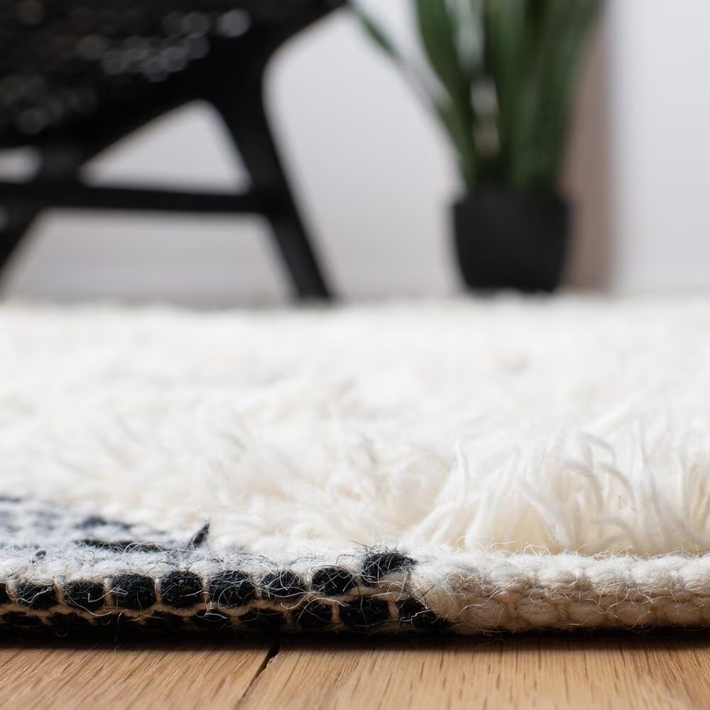 85626-safavieh-natura-nat684a-3-x-5-ivory-and-black-area-rug-1.jpg