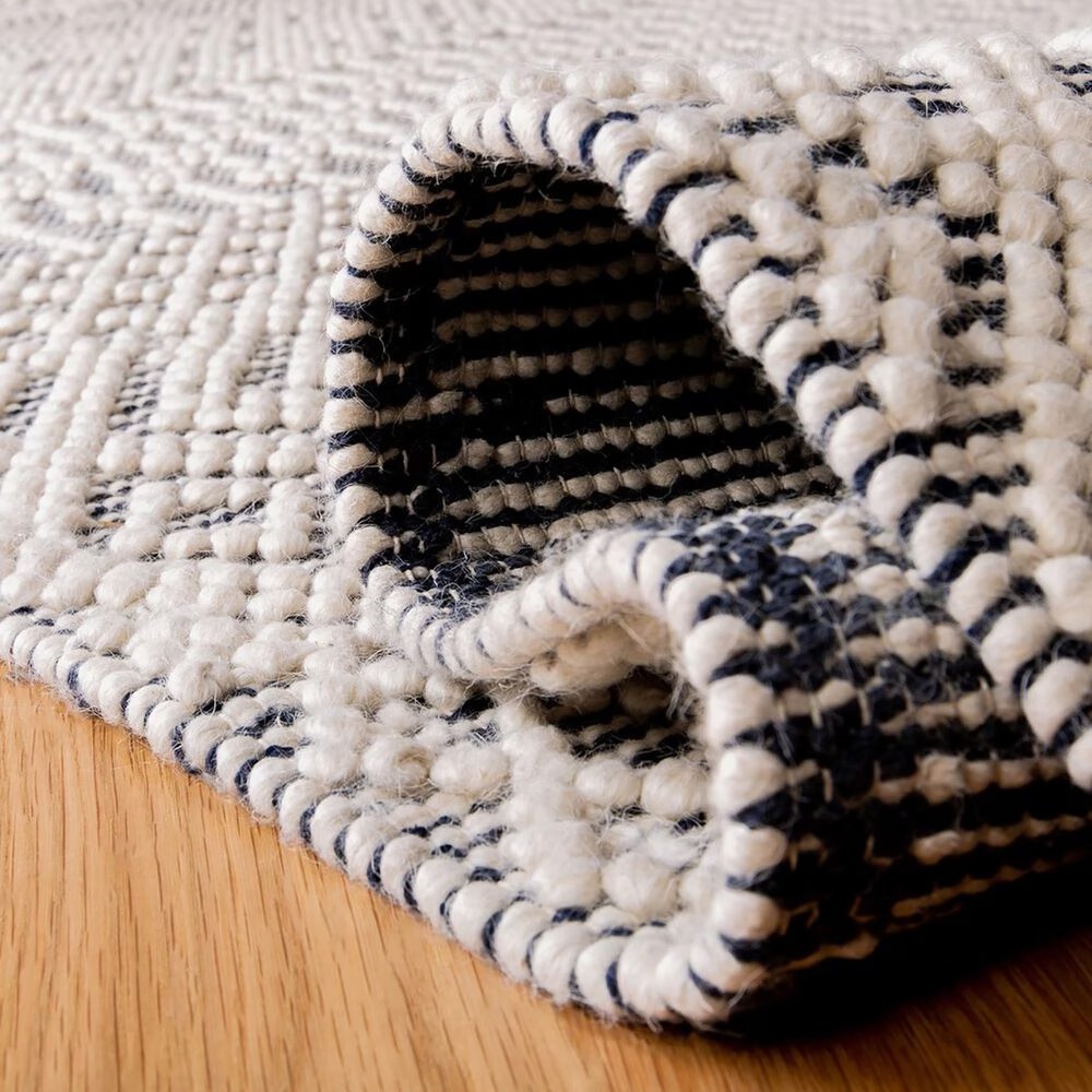 86608-safavieh-natura-nat852n-4-x-6-ivory-and-navy-area-rug-1.jpg