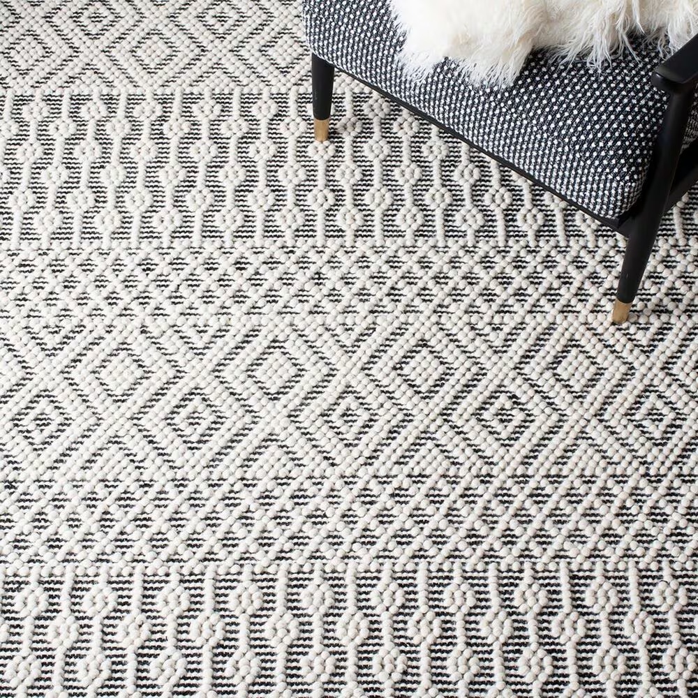 86762-safavieh-natura-nat852z-8-x-10-ivory-and-black-area-rug-1.jpg