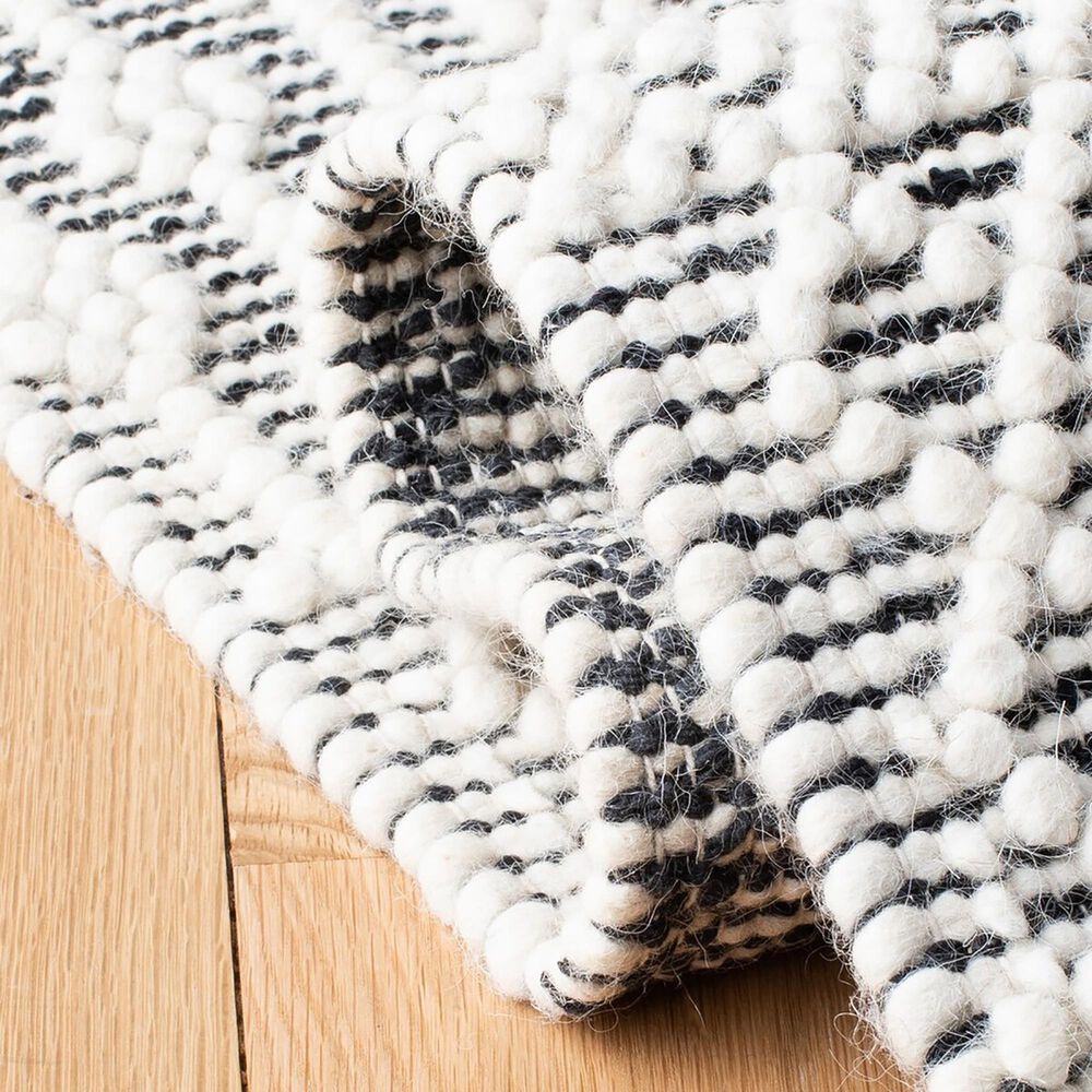 86762-safavieh-natura-nat852z-8-x-10-ivory-and-black-area-rug-1.jpg
