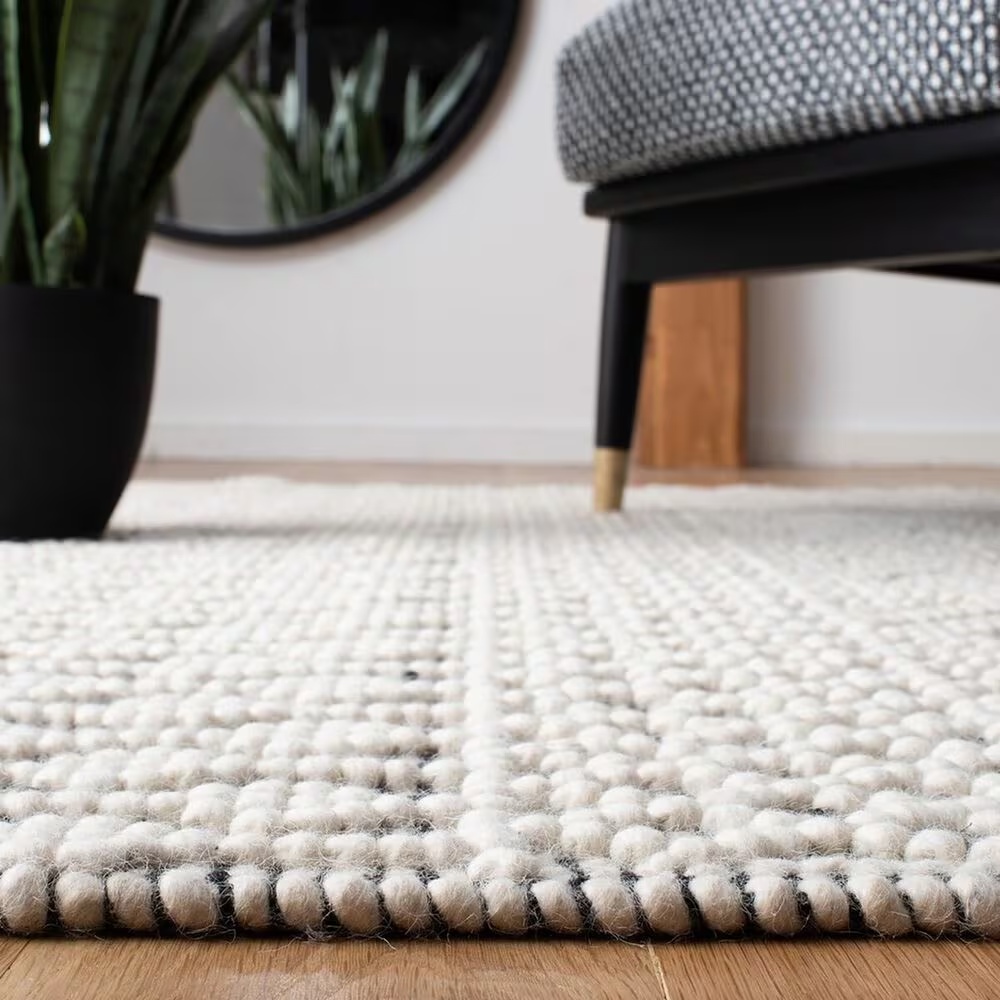 86762-safavieh-natura-nat852z-8-x-10-ivory-and-black-area-rug-1.jpg