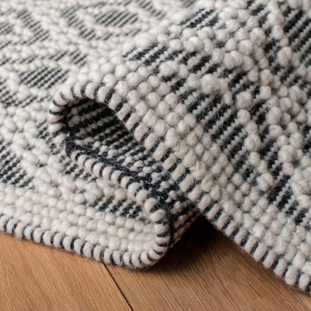 86902-safavieh-natura-5-x-8-ivory-and-black-area-rug-1.jpg
