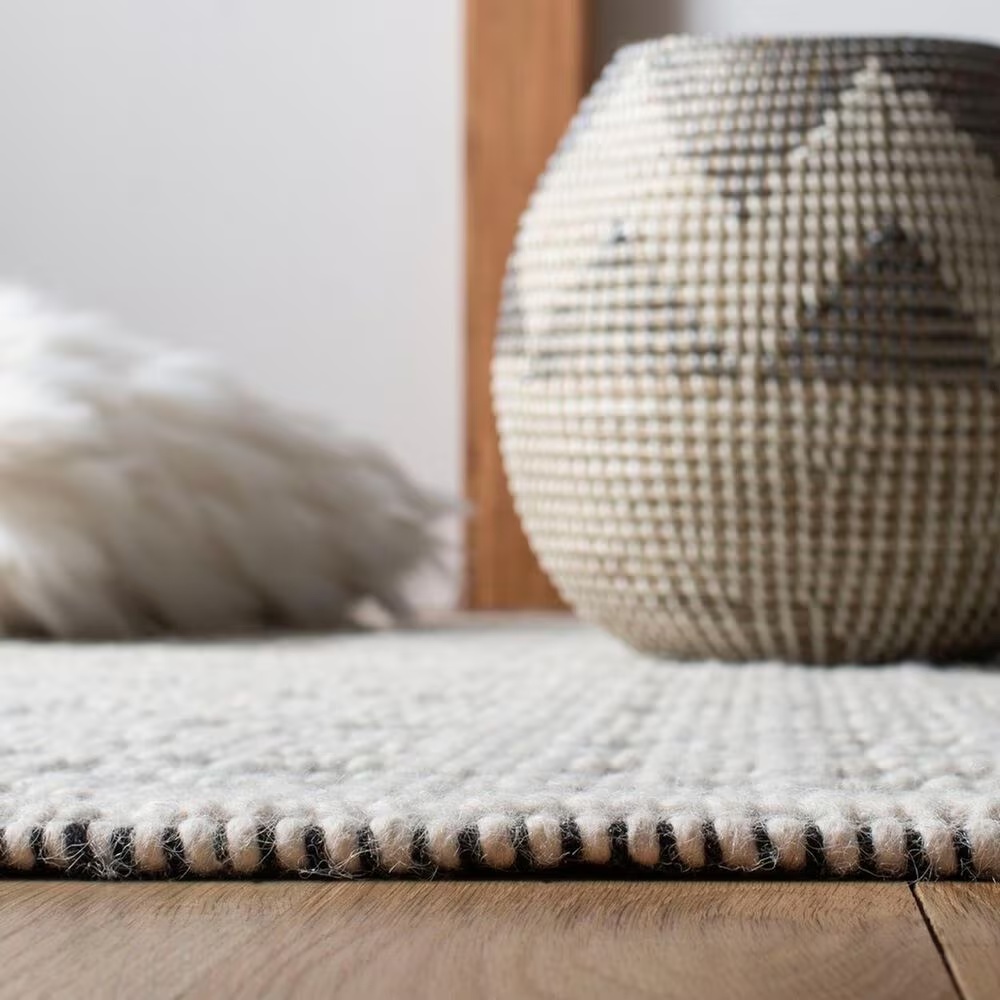 86902-safavieh-natura-5-x-8-ivory-and-black-area-rug-1.jpg