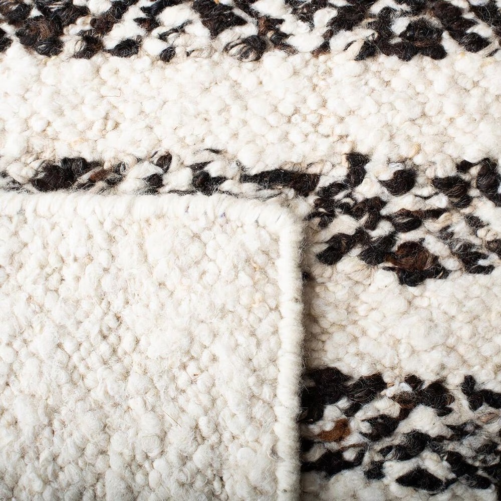 86969-safavieh-natura-nat329z-9-x-12-black-and-ivory-area-rug-1.jpg
