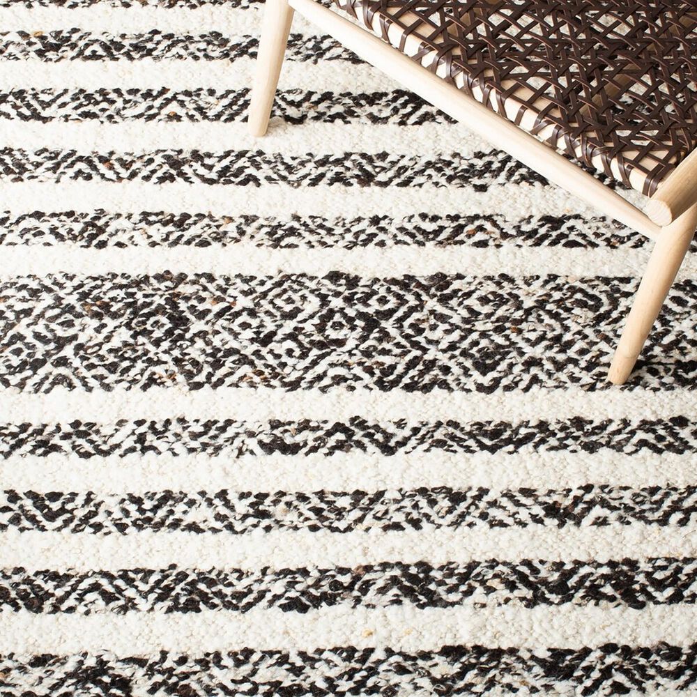 86969-safavieh-natura-nat329z-9-x-12-black-and-ivory-area-rug-1.jpg