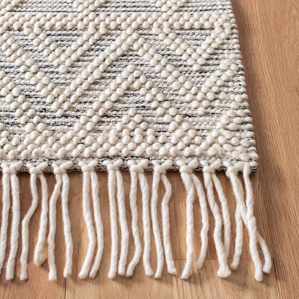 86972-safavieh-natura-nat353a-9-x-12-ivory-and-black-area-rug-1.jpg