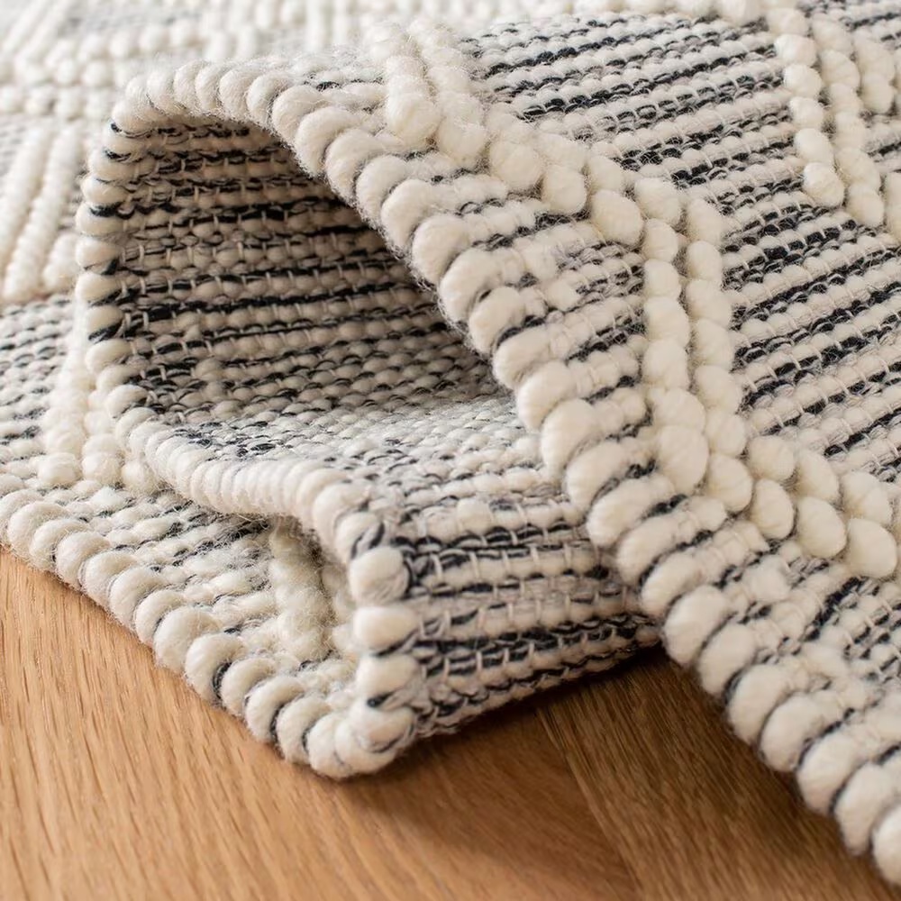 86972-safavieh-natura-nat353a-9-x-12-ivory-and-black-area-rug-1.jpg