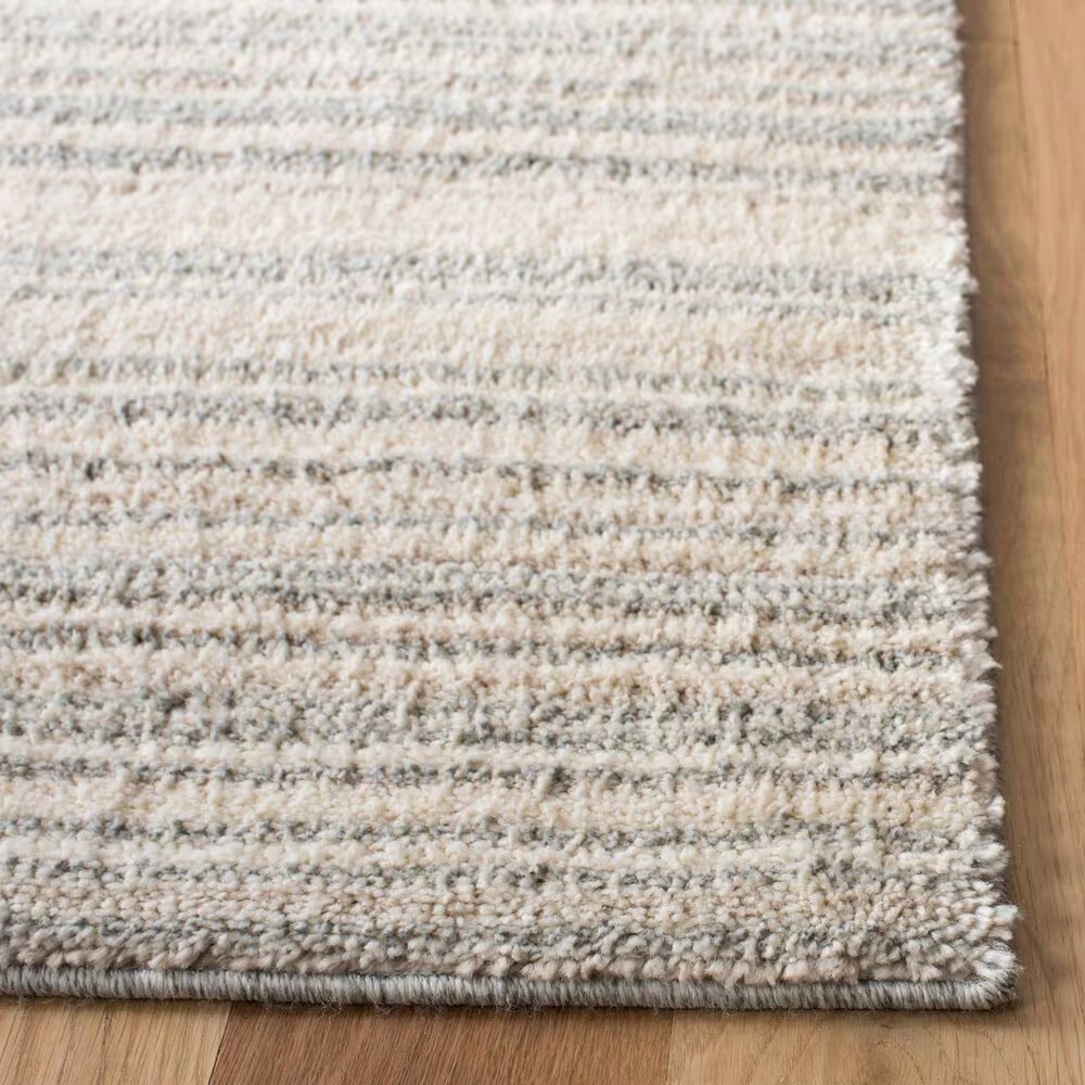 90662-safavieh-martha-stewart-lucia-shag-msr0787f-5-1-x-7-6-light-grey-and-white-area-rug-1.jpg