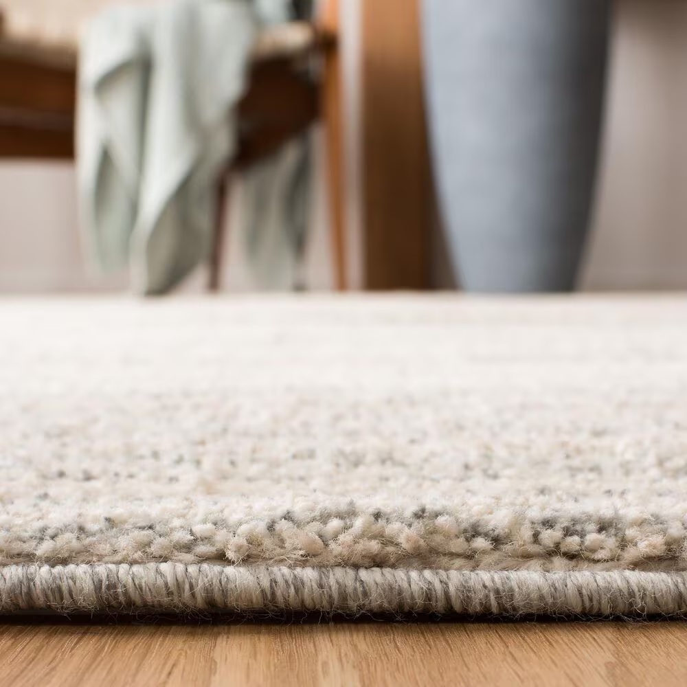90662-safavieh-martha-stewart-lucia-shag-msr0787f-5-1-x-7-6-light-grey-and-white-area-rug-1.jpg